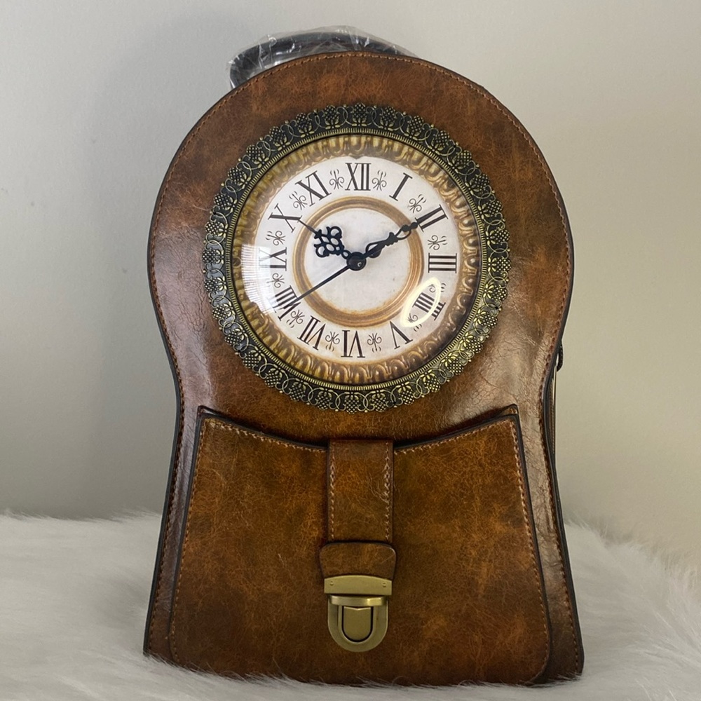 Brown clock purse/ backpack.